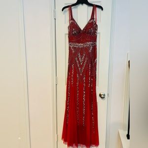 Beautiful dress worn only on one occasion size 8 Color Red
